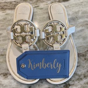 TB Miller metal logo